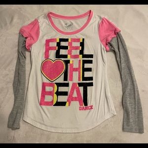 Girls long sleeve top. Justice size 12.